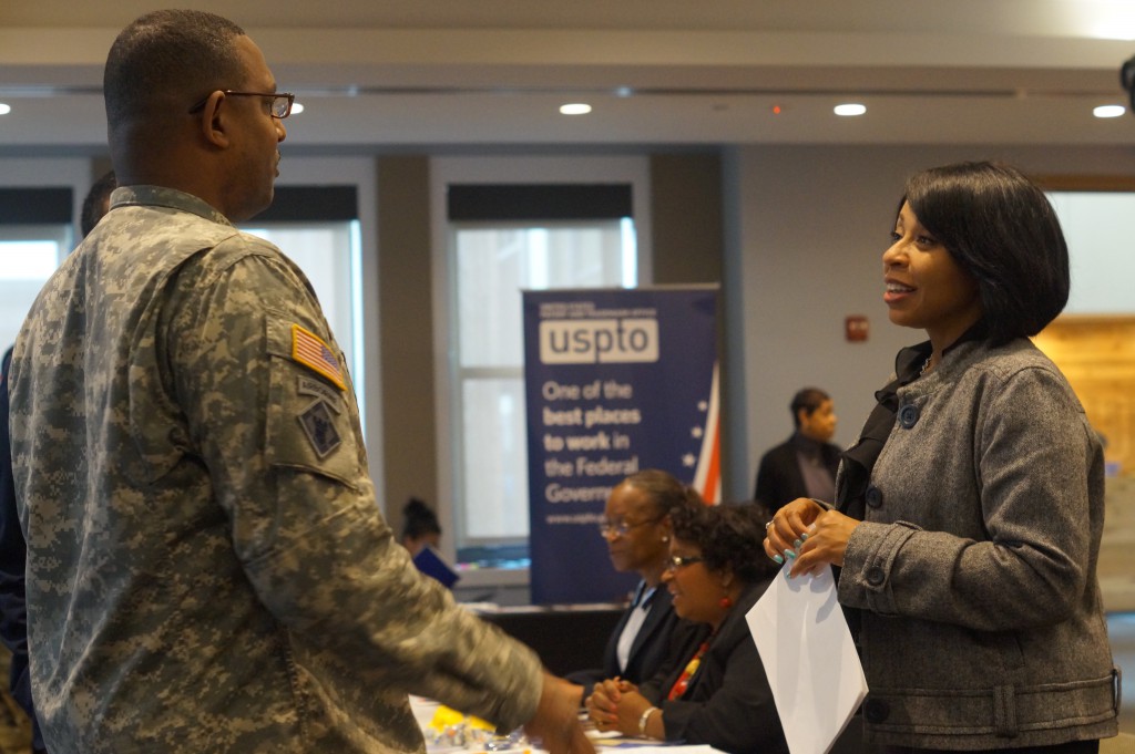 Photo of Service member at career fair Photo of Service member at career fair